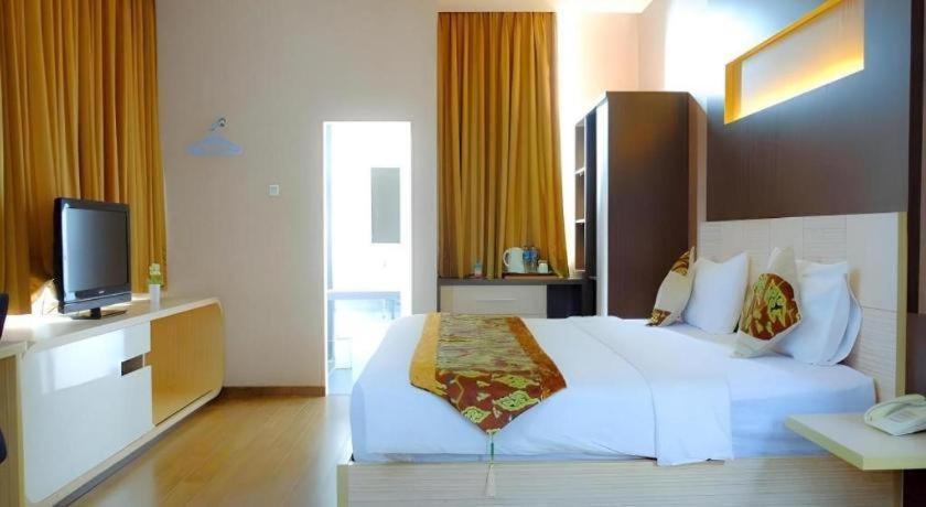 Lotus Hotel Субанг Экстерьер фото